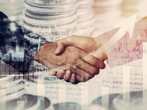 Business handshake on finance prosperity and money technology asset background . Economy and financial growth by investment in valuable stock market to gain wealth profit form currency trading