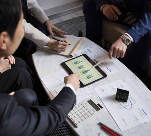 business-people-working-with-ipad-high-angle