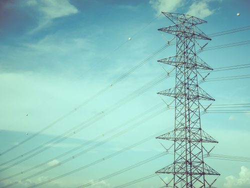 electricity pole on blue sky background - Vintage Filter