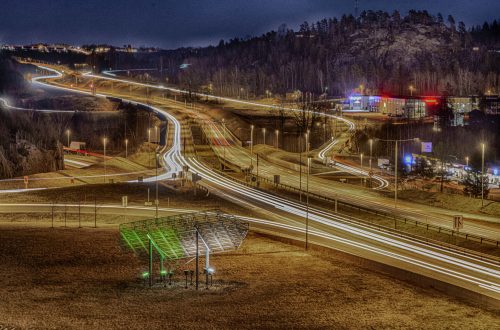 light-trails-road-against-sky-night