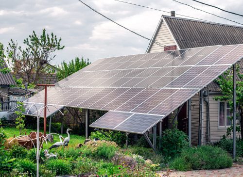 Solar panels on roof of the house renewable energy green power photovoltaic.