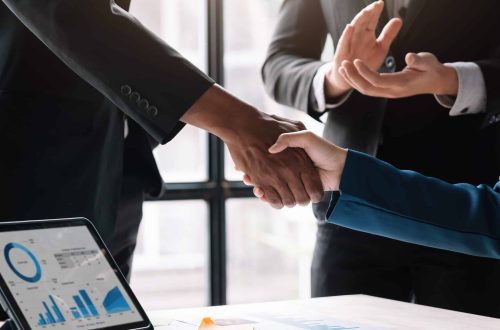 Business people shaking hands, finishing up meeting, business etiquette, congratulation, merger and acquisition concept