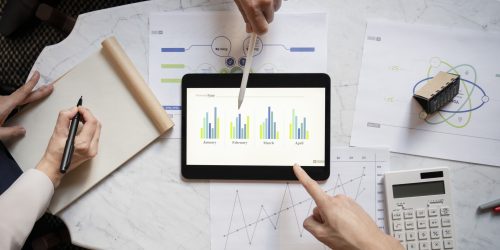 top-view-business-people-working-with-ipad