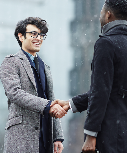 two-business-people-meeting-street (1)